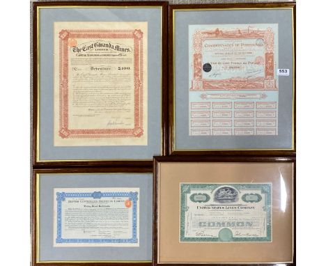A group of four framed historic share certificates.