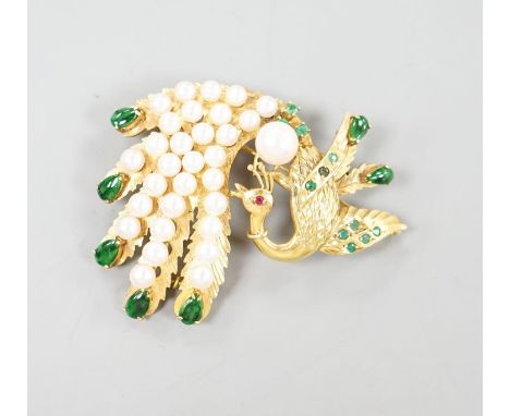 A 14k gold, emerald, graduated cultured pearl and green enamel set peacock brooch, 58mm,gross weight 19.5 grams.