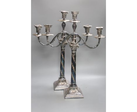 A pair of Georgian style plated two-branch three-light candelabra, height 53cm