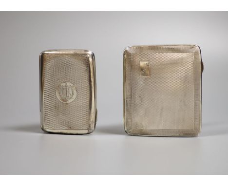 Two engine turned silver cigarette cases, including late Victorian,  largest 86mm.