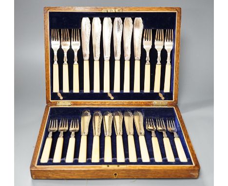 A quantity of plated items to include large oval two handled tea tray, Edwardian four piece tea service and other items