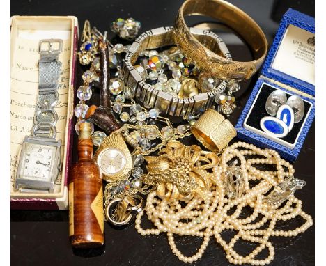 A pair of white metal and two colour enamel cufflinks and a quantity of assorted costume jewellery.