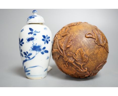 A Chinese blue and white jar and cover, Kangxi period, height 12cm and a Chinese ball