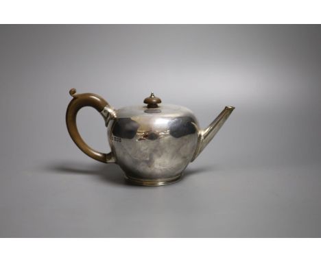 A George V silver bullet shaped teapot, Thomas Bradbury &amp; Sons, London, 1913, gross 13.5oz.