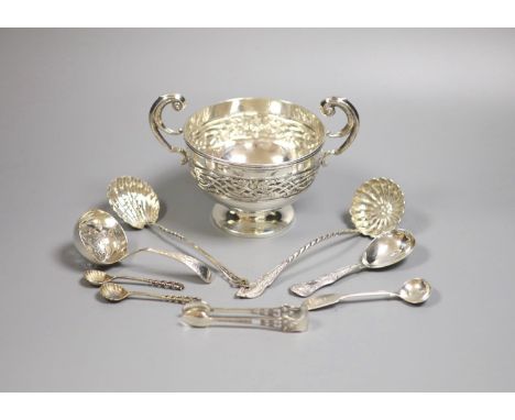 A George V silver Art Nouveau two handled bowl, Birmingham, 1912, height 11.3cm and seven items of silver flatware, 9.5oz.