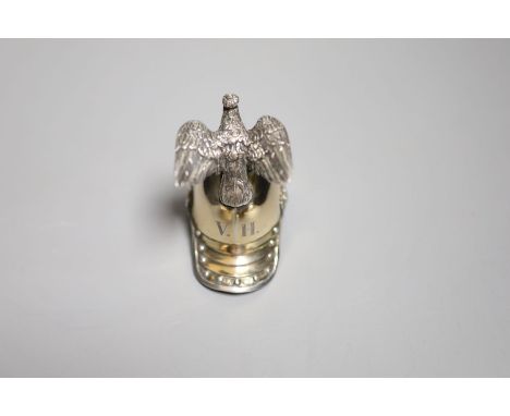 An early 20th century German parcel gilt 800 standard vodka tot modelled as a Prussian soldier's helmet, by Wilm, with eagle 