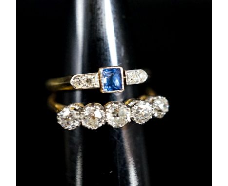 An 18ct and  five stone diamond ring and a similar sapphire and diamond ring (now soldered together), gross 4.2 grams.