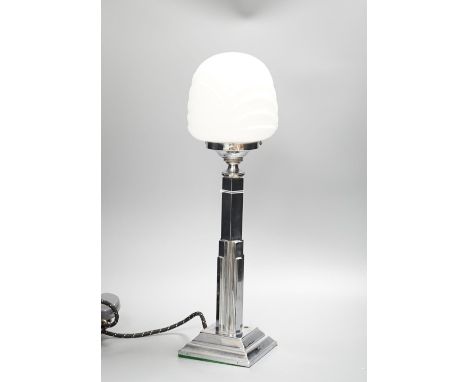 An Art Deci chrome and glass lamp