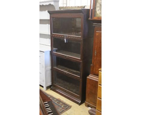 A Globe Wernicke style mahogany four section bookcase. W-86cm, D-36cm, H-172cm.