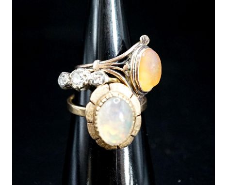 A yellow metal and illusion set three stone diamond ring, size P and two other yellow metal and gem set rings, gross 9.3 gram