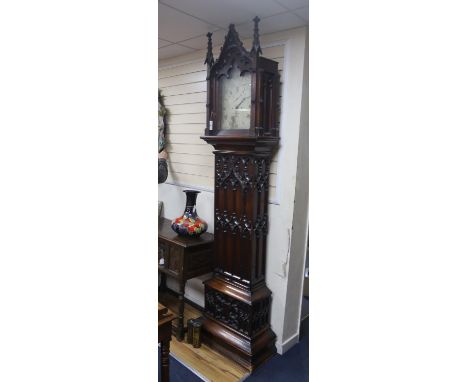 A William IV Gothic revival mahogany longcase clock, the twin train movement with deadbeat, height 258cm