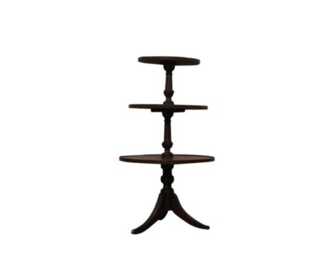 The graduated three tier dumbwaiter, with each tear held on turned supports, all terminating in a&nbsp;Sabre legged tripod ba