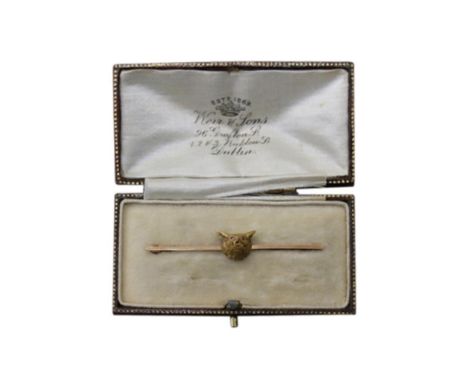 in the form of a bar supporting a foxes head with small ruby set eyes, in original Weir &amp; Sons box