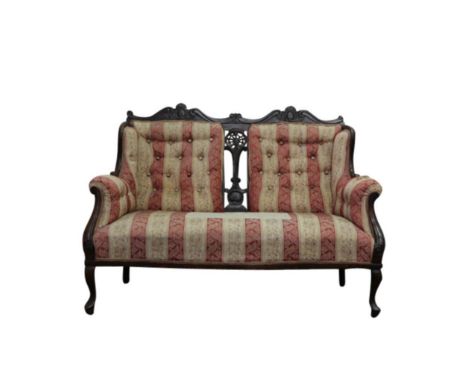 The carved and button upholstered back, above a Serpentine seat, on cabriole legs, 130cm wide, together with a bedroom chair
