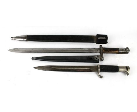 A Spanish 1893/16 bayonet39.5cm single edged single fullered blade stamped Artilleria, with wooden grips, complete with metal