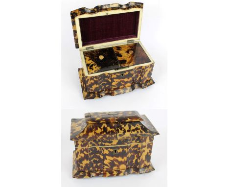 A 19th Century Serpentine fronted tortoiseshell tea caddy The hinged cover lifts to enclose two lidded compartments, raised o