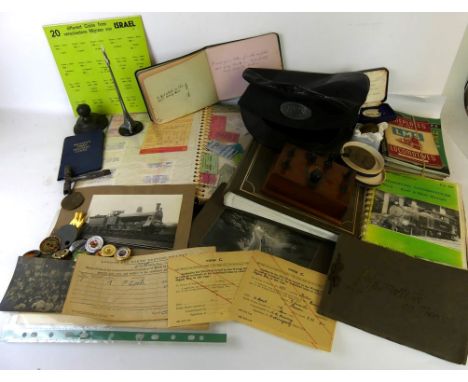 A large collection of assorted railwayania, early 20th CenturyTo include black and white photographs of steam trains, drivers