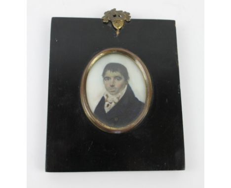 A Georgian hand painted portrait miniatureDepicting a distinguished gentleman, inset in lacquered frame, 12x10cm