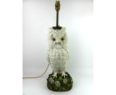 A large 19th Century English porcelain table lampModelled in the form of an owl, raised on floral encrusted base, impressed d