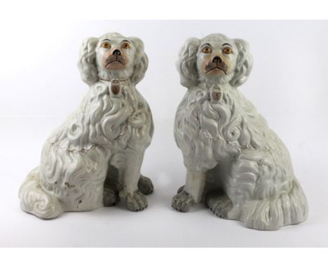 A pair of 19th Century Staffordshire Spaniels with separate legs'High Society', circa 1845, height 30cm   CONDITION REPORT:  