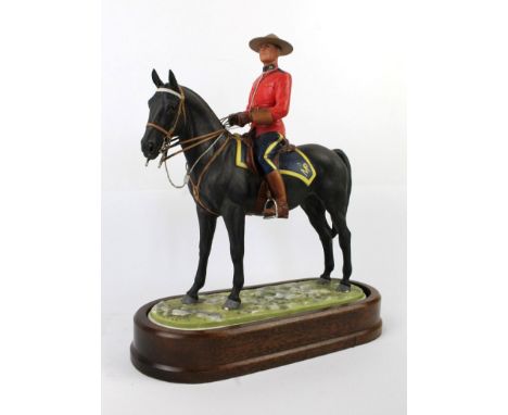 A Royal Worcester model of a Royal Canadian Mounted PolicemanFrom the Equestrian series, modelled by Doris Lindner, length 26