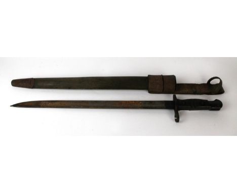 A WWI period United States of America Remington bayonet, dated 1917With single edged single fullered blade, wooden grips, com