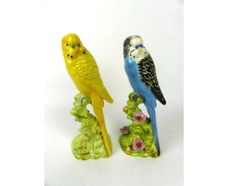 Two Beswick models of budgerigar Model number 1216, first and second version, height 18.5cm   CONDITION REPORT:  1217 - resto