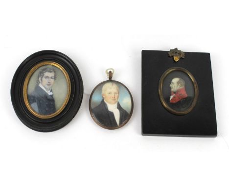 Three 19th Century and later hand painted portrait miniaturesTo include a side view of a gentleman wearing red jacket, signed