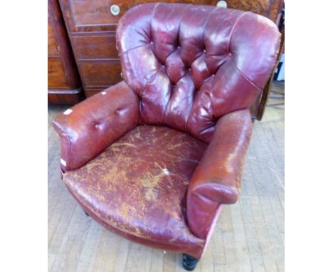 A 19th Century red leather and pink velour upholstered button back armchairRaised on turned legs, height 88cm, width 85cm, de