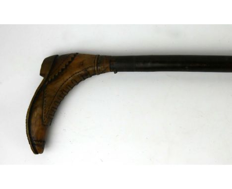 A 19th Century walking stickThe handle modelled in the form a boot, length 89cm   CONDITION REPORT:  Probably lacking a silve