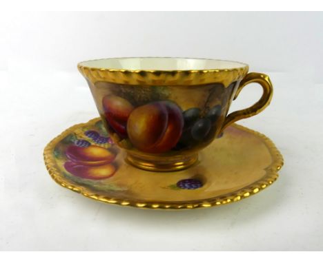 A Royal Worcester hand painted cup and saucerDecorated with fruit, the cup signed by Smith, the saucer by another artist   CO