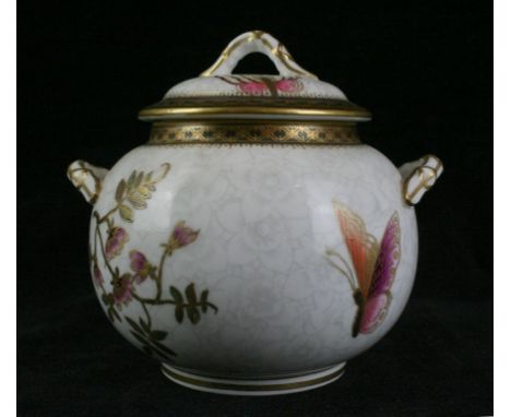 A 19th Century Worcester hand painted twin handled lidded vase and coverDecorated with roses with gilt highlights, puce facto