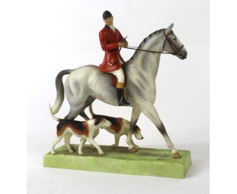 A Royal Worcester model of a  'Huntsman and Hounds'Modelled by Doris Lindner, No.3115, length 18cm   CONDITION REPORT:  No wo
