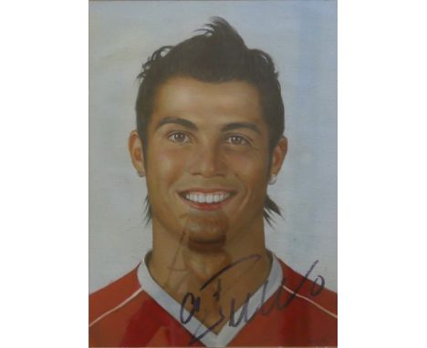 A. D. Yates (British, Contemporary) - A head and shoulders portrait of footballer Cristiano RonaldoOil, bears original Cristi