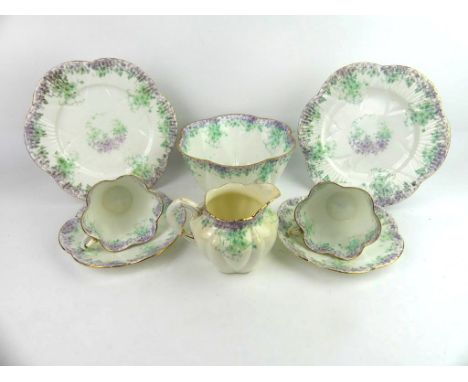 A Wileman Foley China thirty five piece tea serviceDecorated in the Trailing Violets pattern in the Gainsborough shape, compr