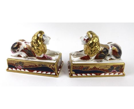 A pair of Royal Worcester Trafalgar LionsFrom the Nelson collection, length 15cm