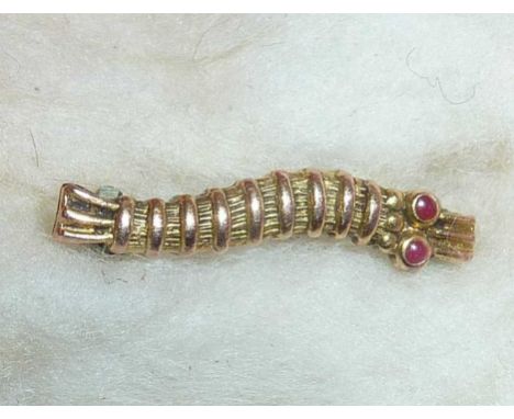 WW2 RAF 9ct gold Caterpillar Club pin badge with ruby or garnet eyes in the form of a silkworm. Awarded to airmen who have ha