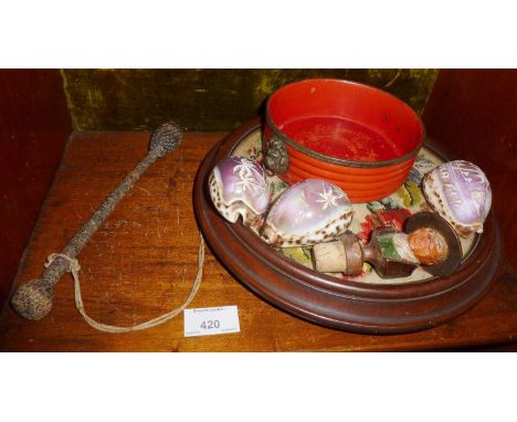 Old carved Fijian conch shells, weighted ropework fishing priest, Regency wine coaster, Victorian tapestry teapot stand