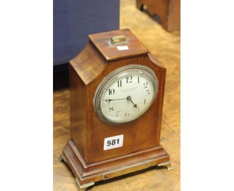 Edwardian Mahogany Mantle Clock, the white enamel face marked 'Thomas Armstrong & Brother, Manchester & Liverpool', on four b