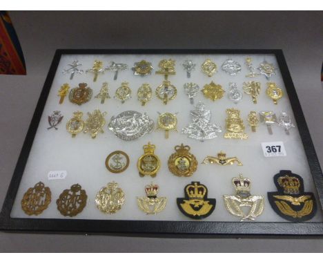 Case of 42 British Army, Navy and RAF Cap Badges including Submarines