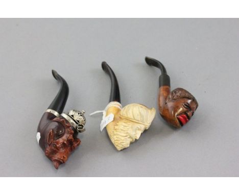 Meerschaum Pipe with Indian Gentleman, Two Other Pipes with Goats Head and African Man