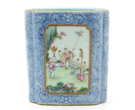 Blue floral ground with Famille Rose decor depicting Chinese boys playing in garden, marked Qianlong, 10 cm. tall.