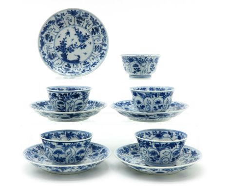 Floral design, 18th Century, saucers are 11 cm. in diameter, small chip on rim.