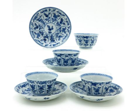 Floral design, 18th Century, saucers are 13 cm. in diameter, some with chip and hairline.