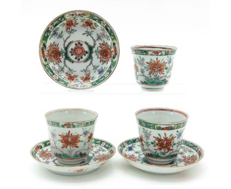 Floral design, 18th Century, saucers are 12 cm. in diameter, one saucer restored.
