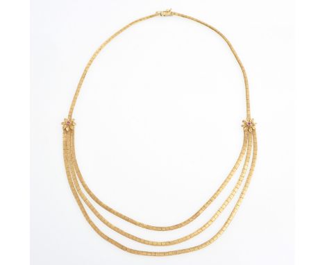 Flower decor on each side of necklace set with ruby, 31 gram.
