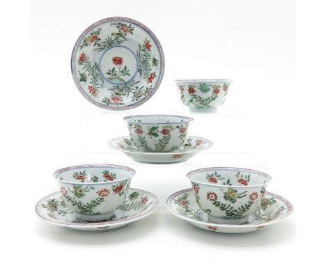 Polychrome floral decor with butterflies and birds, marked on bottom with double ring and symbol, 18th Century, saucers are 1