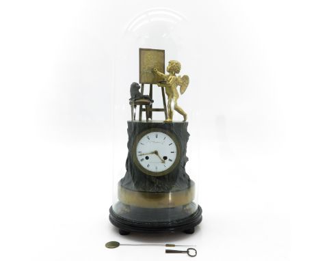Depicting angel painting a portrait, under glass dome, Pendule is 45 cm. tall.