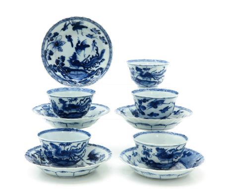 Floral decor with phoenix, 18th Century, saucers are 13 cm. in diameter, some with chip and hairline.