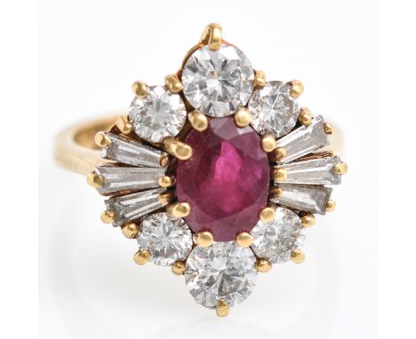 Set with Ruby and 12 brilliant and baguette cut diamonds, ring size 15.